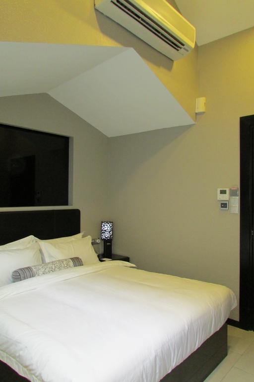 The Southbridge Hotel Singapore Rum bild